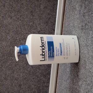 Lubriderm daily moisture lotion . New fragrance free.